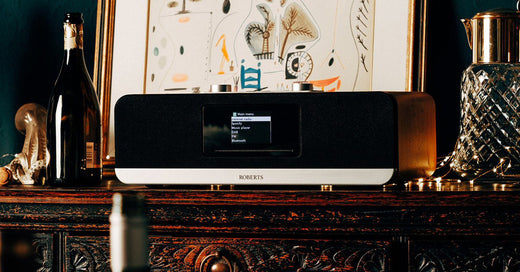 Roberts Stream 67 radio and speaker on mahogany table