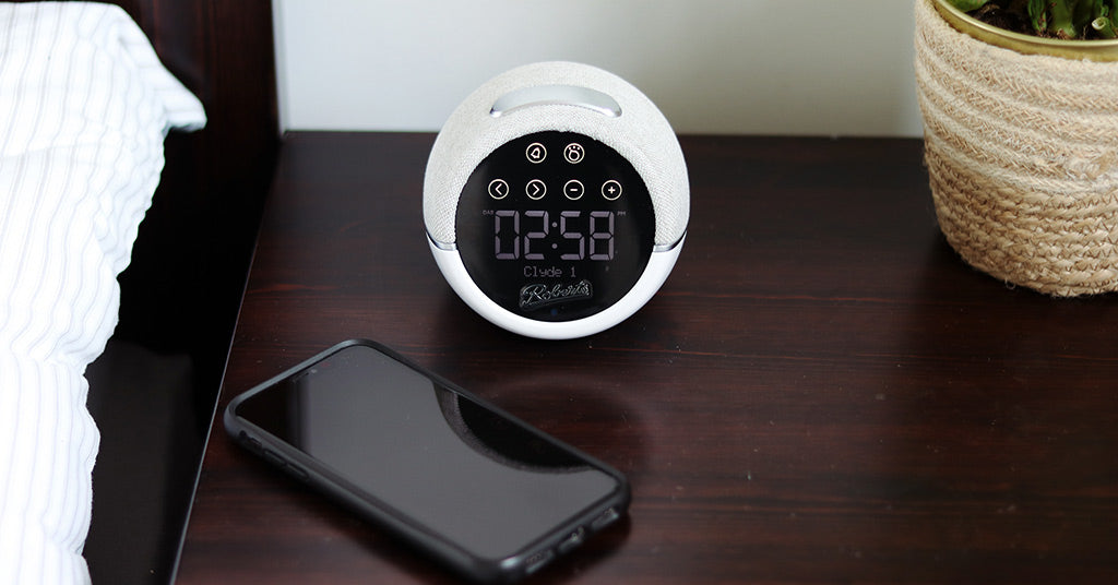 Roberts Zen Plus radio on bedside table next to iPhone