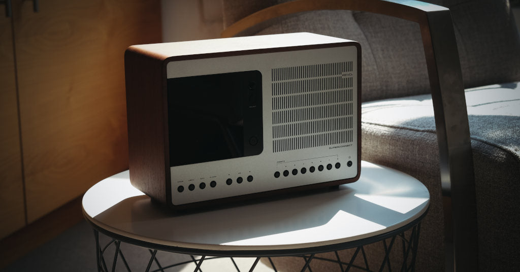 Silver and walnut DAB radio on side table