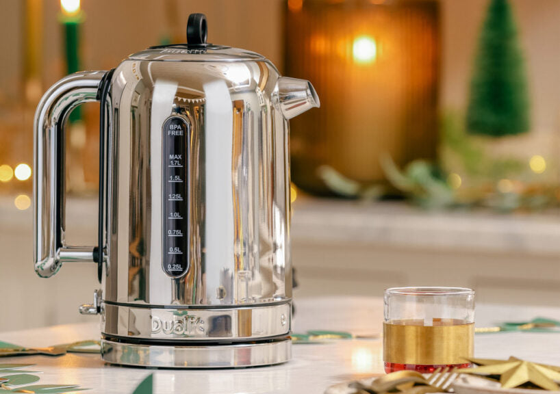 Steel kettle on table