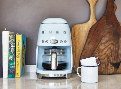 Blue Smeg filter coffee machine on kitchen countertop